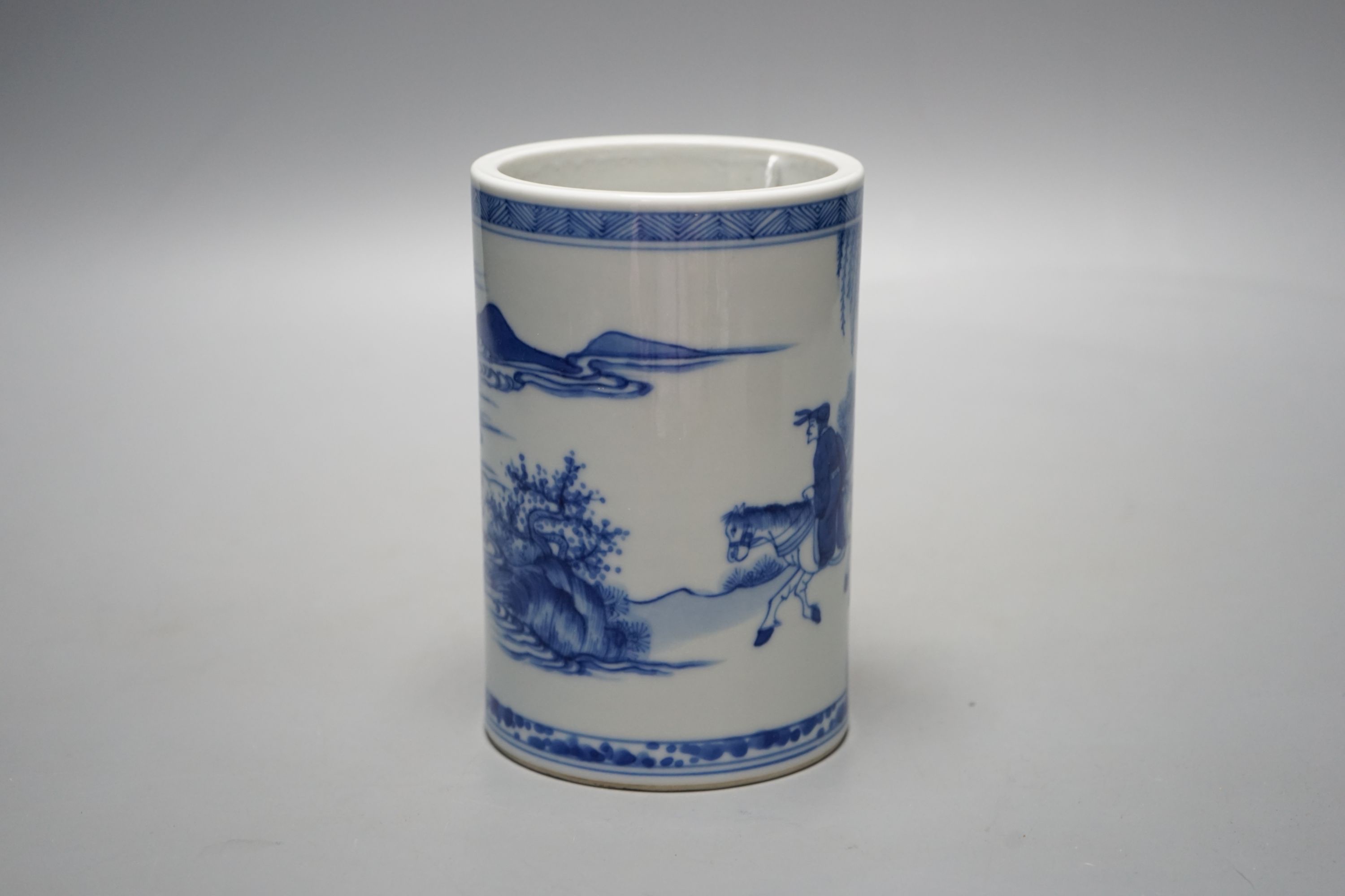 A Chinese blue and white brush pot, 14 cms high.